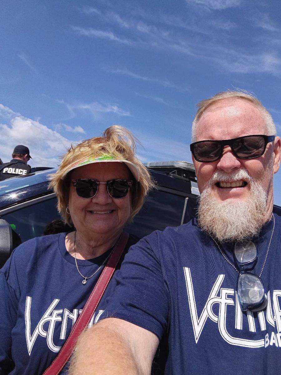 Two fans wearing Ventura Band shirts